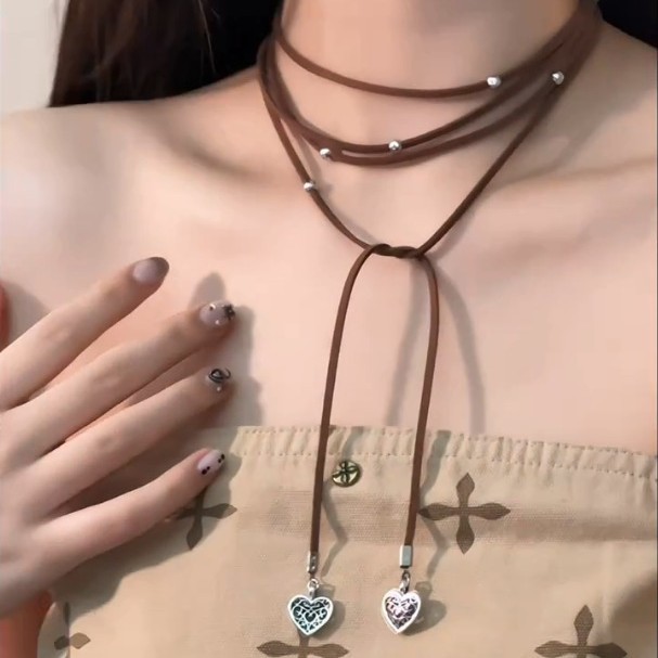 0ca53660-3f19-4b1e-86e9-40c5b819eab5 Yabi Accessories Bohemian Heart-Shaped Long Leather Rope Wrap Necklace - View 4