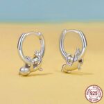 silver earrings - View 1