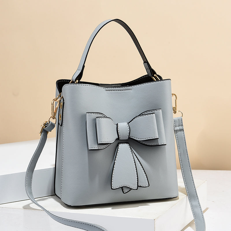 478387f1-41c2-483b-a376-29f92846a384-1 handbag Classic Bucket Bow Women's Crossbody Bag - Large Capacity Portable Women's Handbag