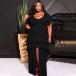 Solid-color Layered Dress With A High Slit On The Front And Ruffled Hem - Main product image