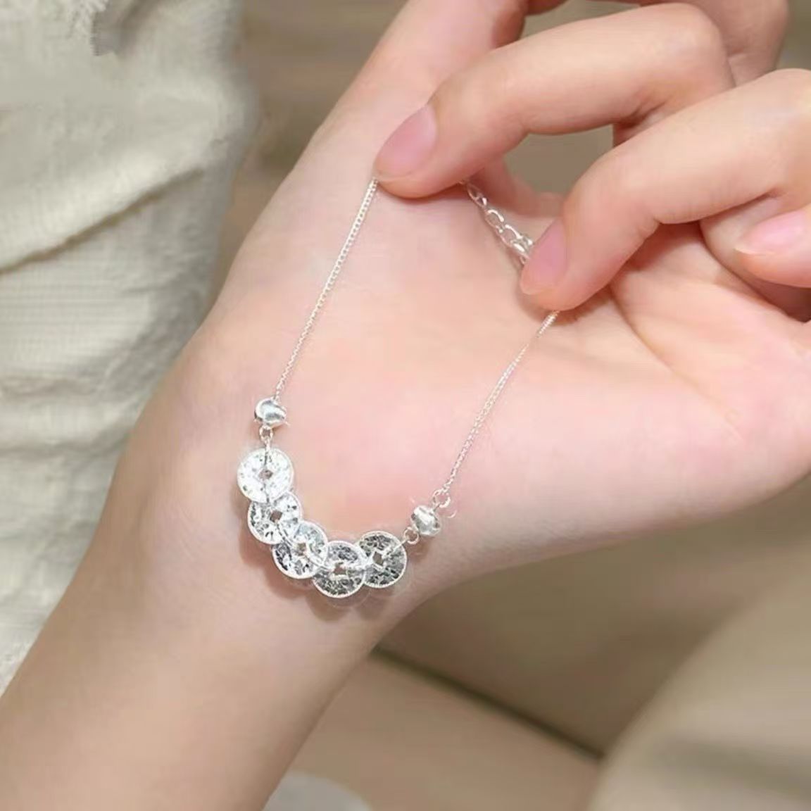 786f121c-a6fe-4865-ad5f-d037beb957ea Shui Bingbing Five-Copper-Coin Diamond-Encrusted Bracelet - View 5