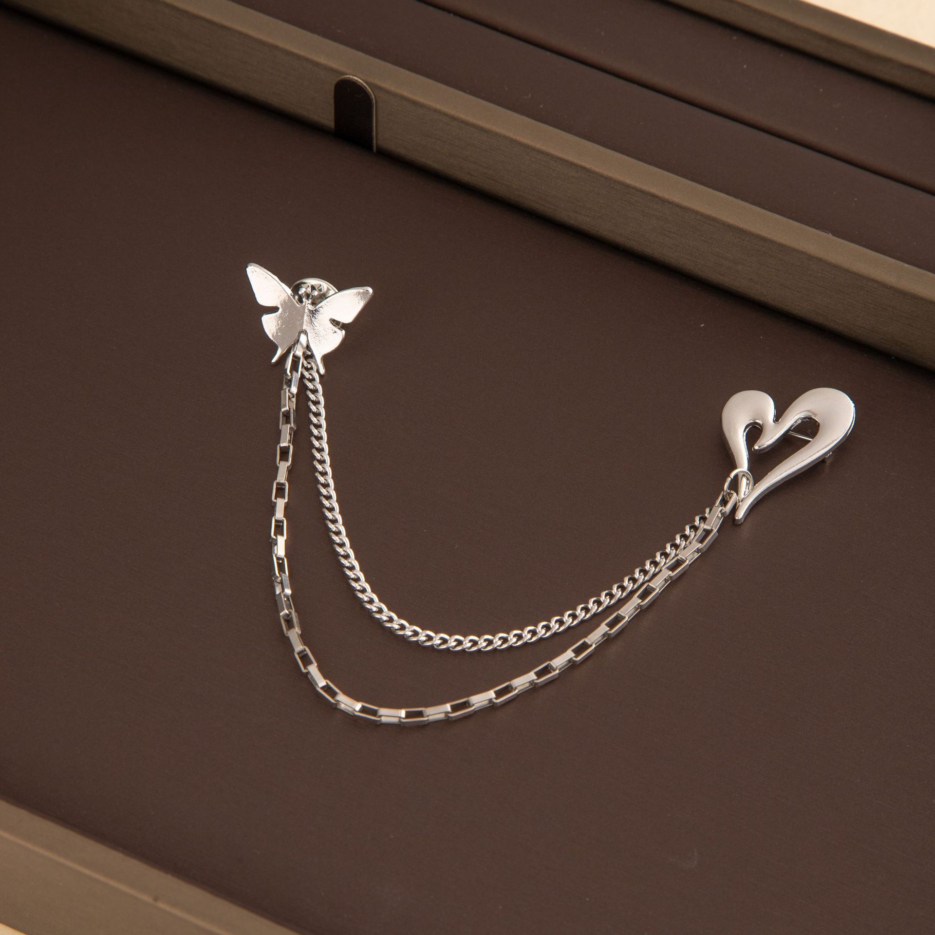 8762ae13-14b2-40e9-851d-3537e2ec08b5.jpg Hollow Heart & Butterfly Tassel Brooch, Minimalist Versatile Lapel Pin, Anti-Exposure Accessory For Suits & Dresses, Elegant Fashion Jewelry