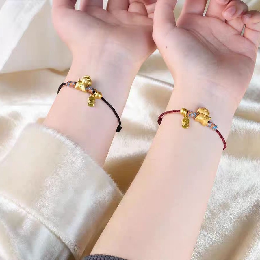 90f7961b-8189-4b69-80f0-6ee54f9d5a90_trans Year Of The Horse Handwoven Bracelet With Money Horse Blessing Charm For Women In Red Cord - View 3