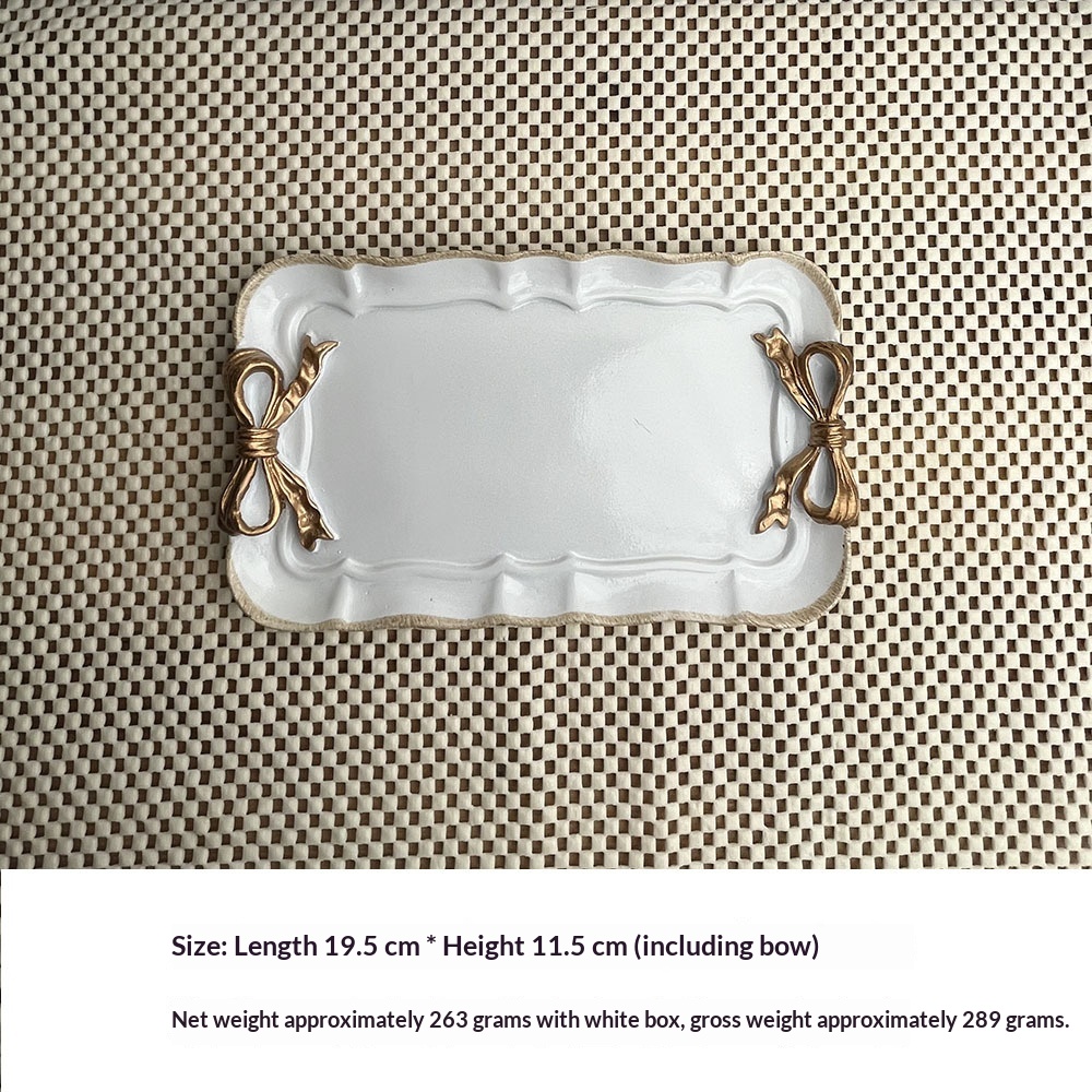 a4033b4c-da9b-4684-9ad7-a7a91a3ce111_trans.jpeg Creative Resin French Romantic Gold-plated Bow Jewelry Tray