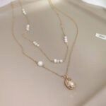 Double-layer Titanium Steel Shaped Freshwater Pearl Geometric Ellipse Beanie Pendant Necklace - View 1