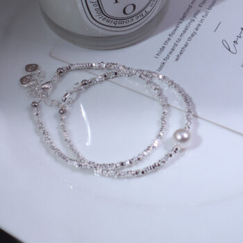A Subtly Luxurious Niche-designed Bracelet Featuring A Few Pieces Of Silver - View 1