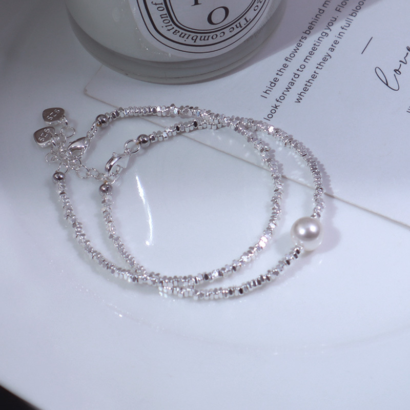 e34c3d0f-1aaf-44b0-baf4-8cdc948e842e A Subtly Luxurious Niche-designed Bracelet Featuring A Few Pieces Of Silver - View 1