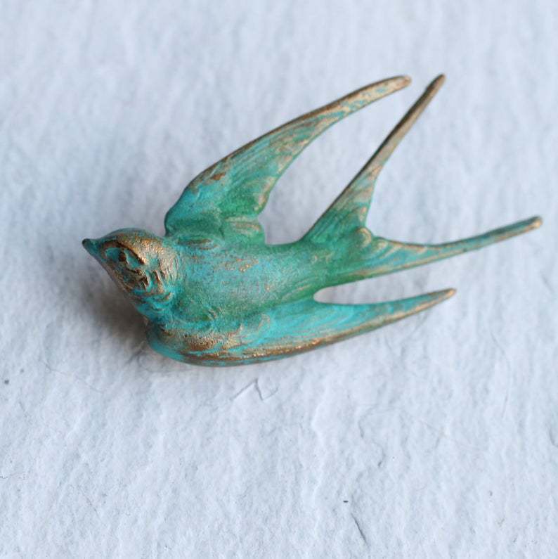 f1407528-6185-4546-ac24-cc27c75ba2d8.jpg retro green swallow