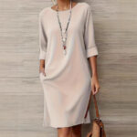 Versatile Solid-color Mid-sleeve Dress With Side Pockets - Main product image